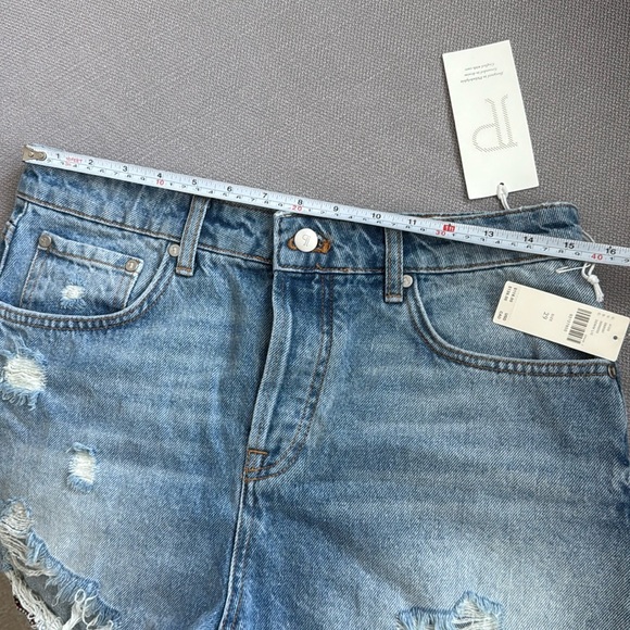 Anthropologie Pilcro Distressed Blue Jean Shorts with Embroidered Hem - Picture 8 of 13